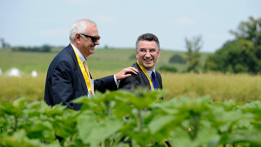 Jean-Philippe Puig smiling in a field - Groupe Avril